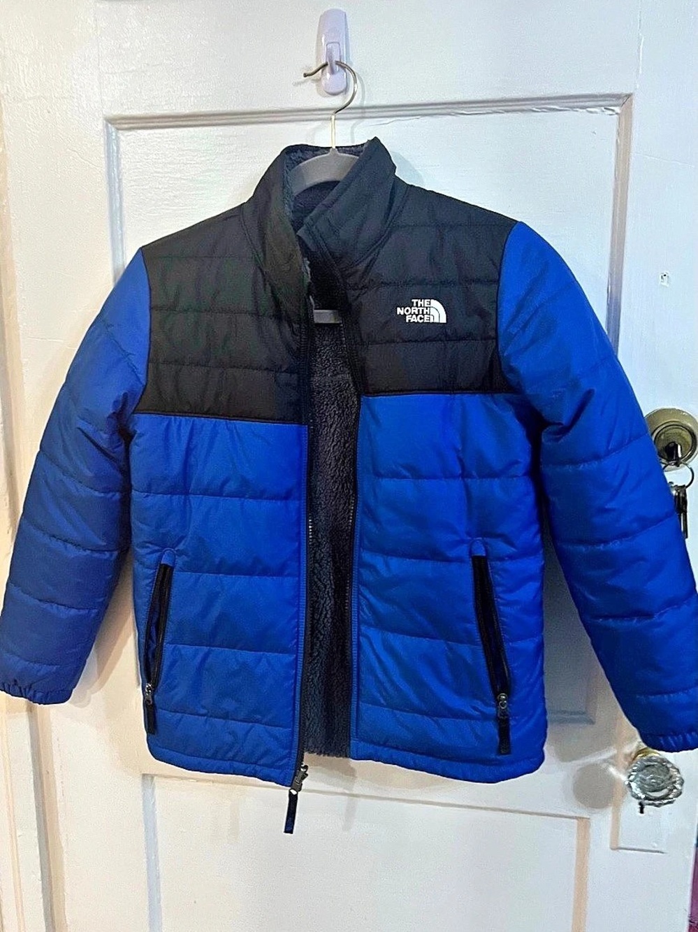 The North Face reversible mossbud swirl jacket youth Puffer Jacket Blue & Black
